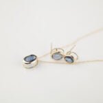 PAR ARETES ORO 14K BISEL ZAFIRO OVAL 7X5