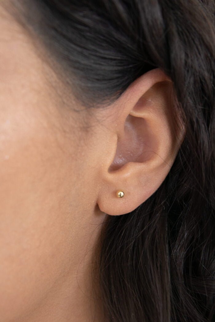 BROQUEL ANIA ORO 14K BOLA MINI 2MM - Imagen 3