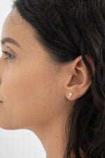 BROQUEL AGATA ORO 10K 3 ZIRCONIAS CURVO - Imagen 2