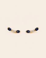 PAR ARETES ORO 14K CURVOS ZAFIRO 10PTS Y DIAMANTES 4PTS